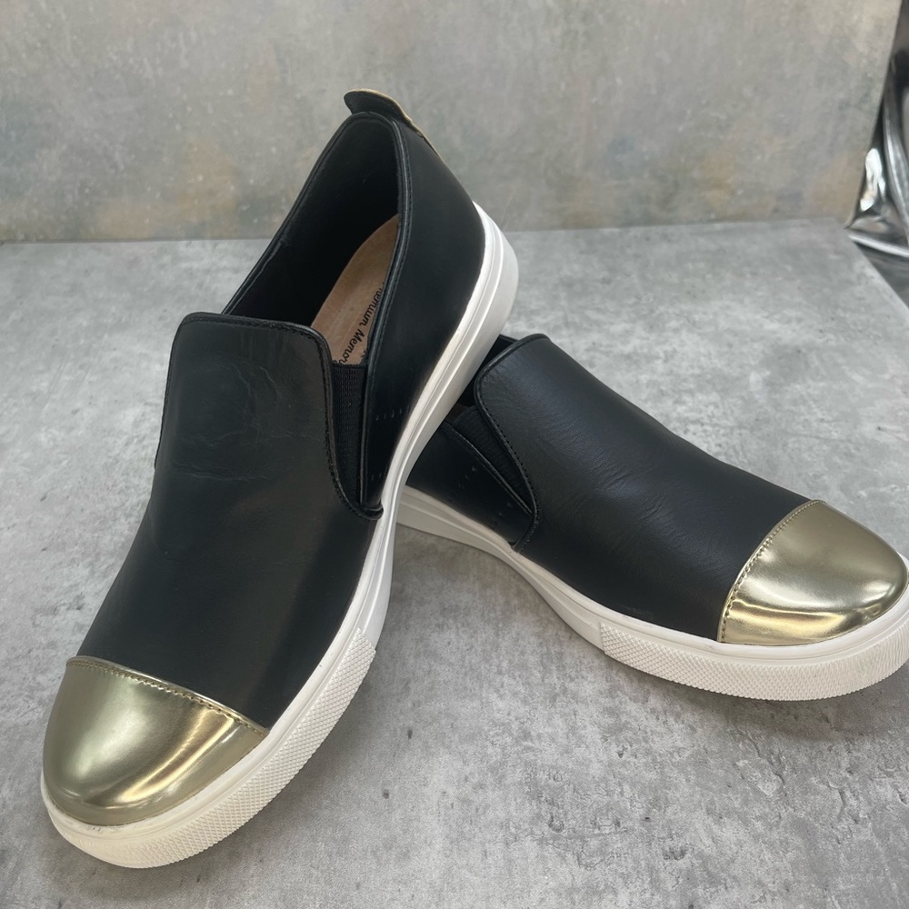 Size 7 Black and Gold Skechers Slip on Shoes